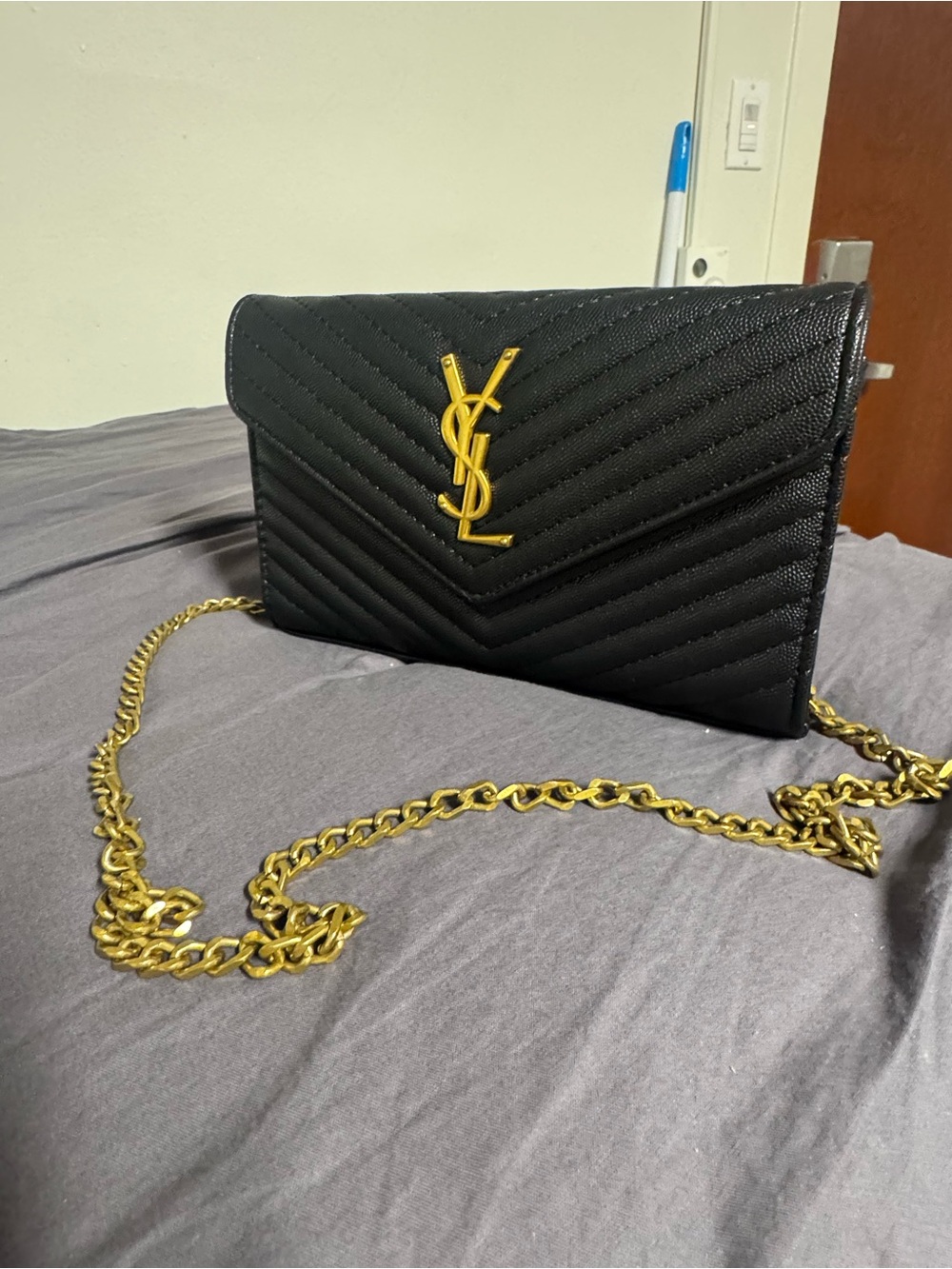 Saint Laurent Black Quilted Leather YSL Chain flap with Gold Hardware